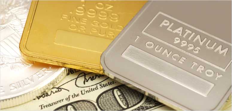 Gold and platinum bars with dollar bill.